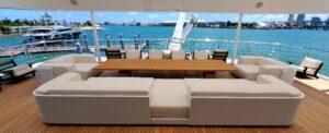 Superyacht deck with white and cream yacht furnishings