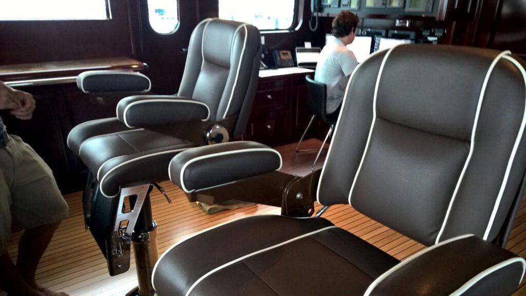 leather upholstered crew seats on superyacht