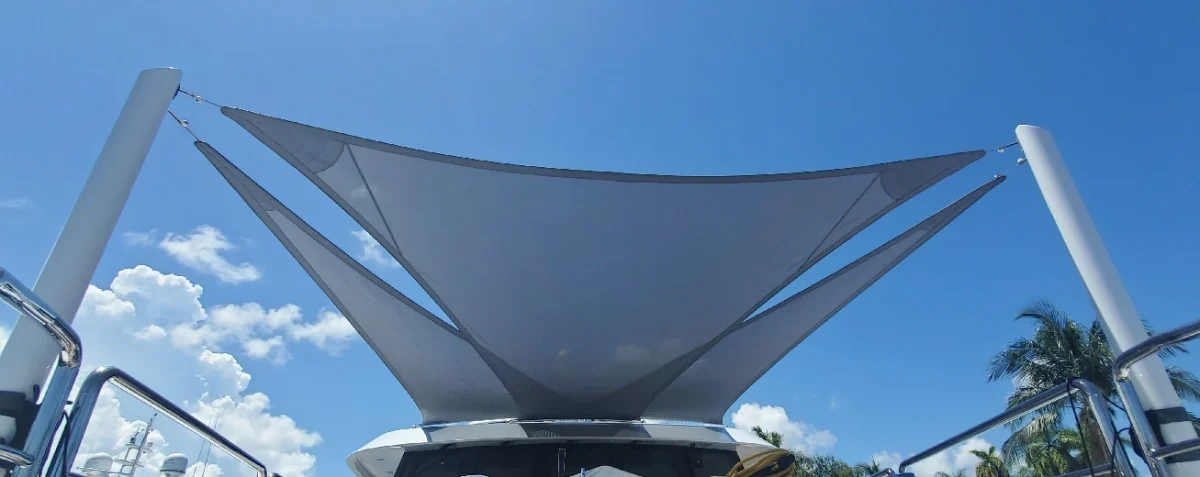 Gray sail awnings on a bright blue day