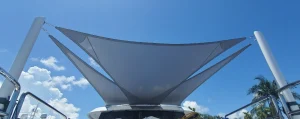 Gray sail awnings on a bright blue day
