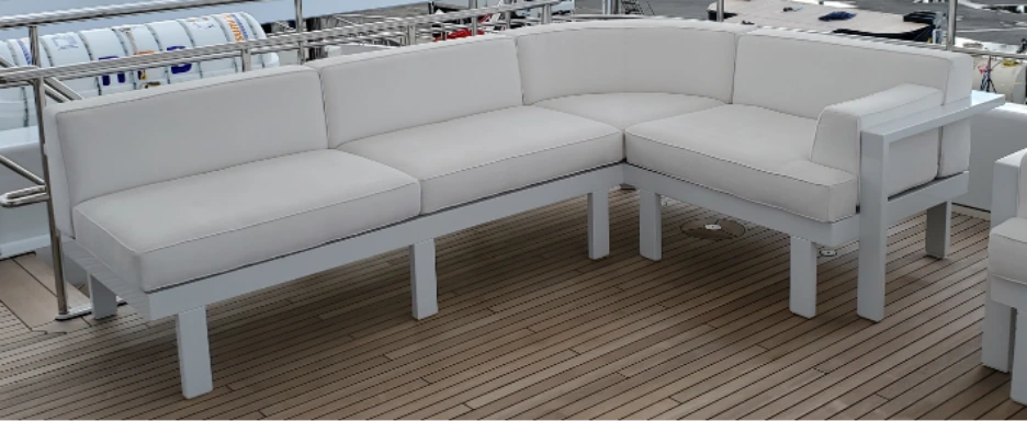 Yacht sofa built with white cushions on yacht decks.
